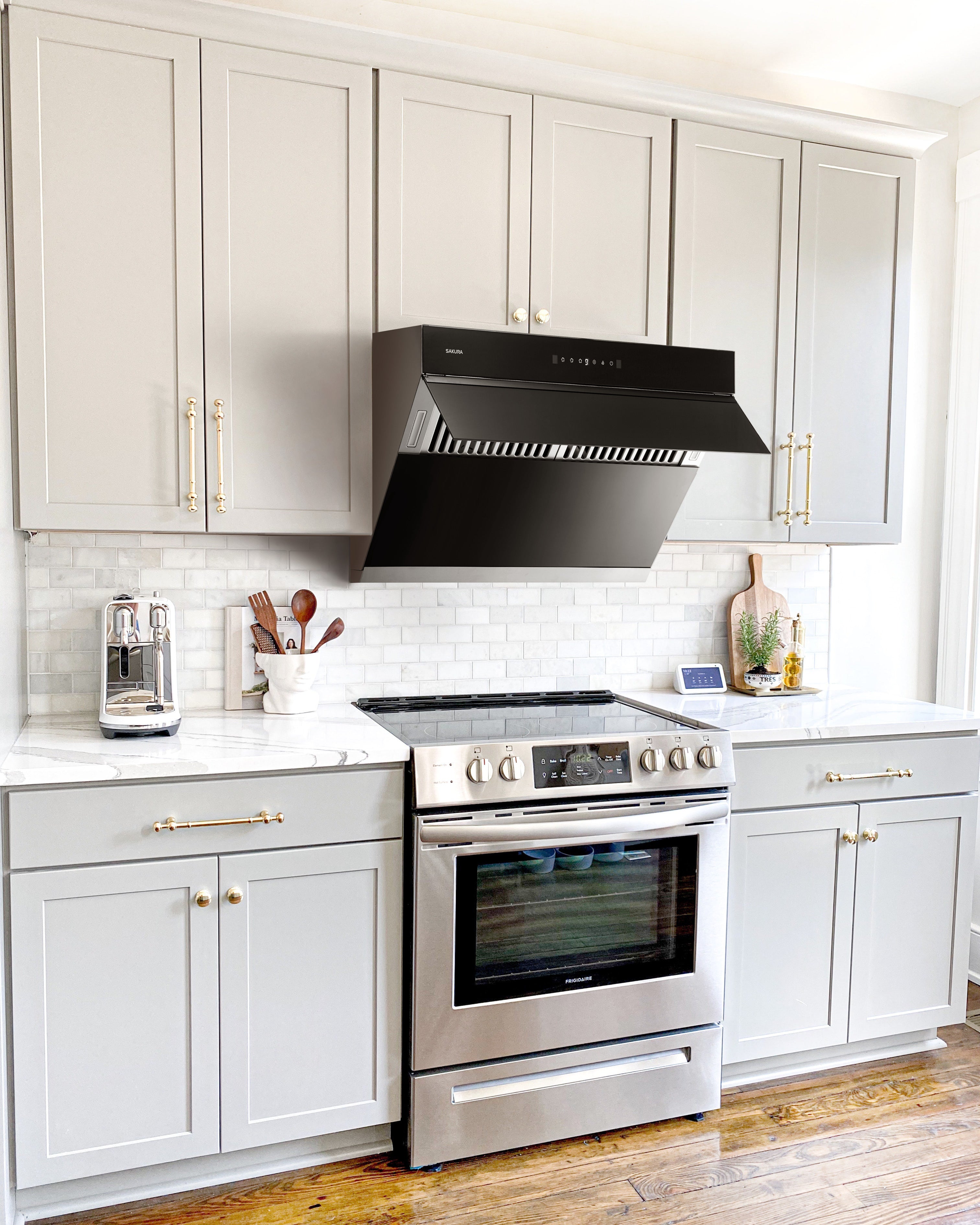 SAKURA glass range hood providing 1000 CFM powerful ventilation for heavy cooking in American kitchens