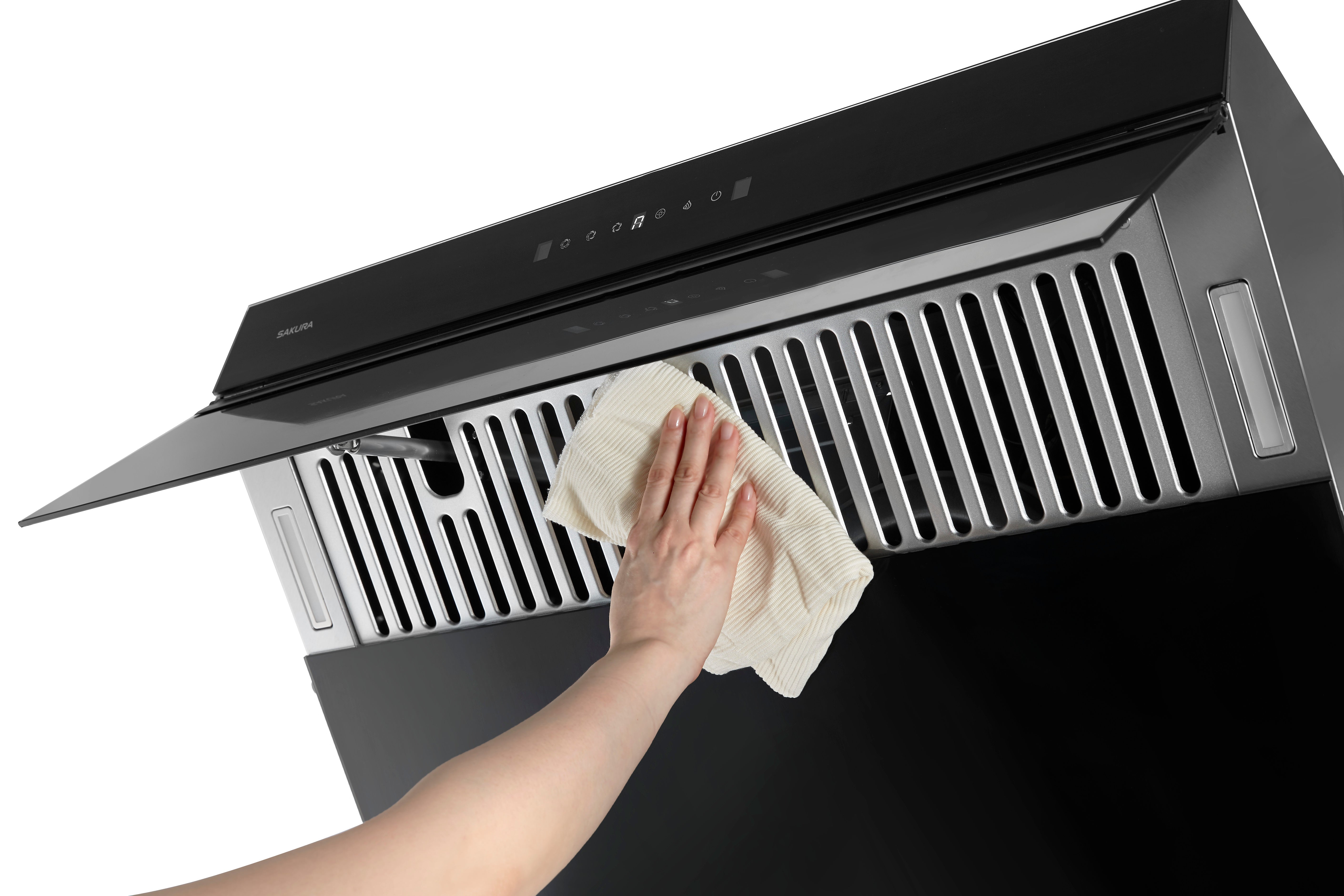 Close-up of the non-stick nano-coated grease filter on SAKURA range hood being wiped clean effortlessly